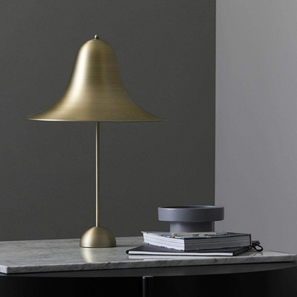 The iconic Pantop Table Lamp in antique brass