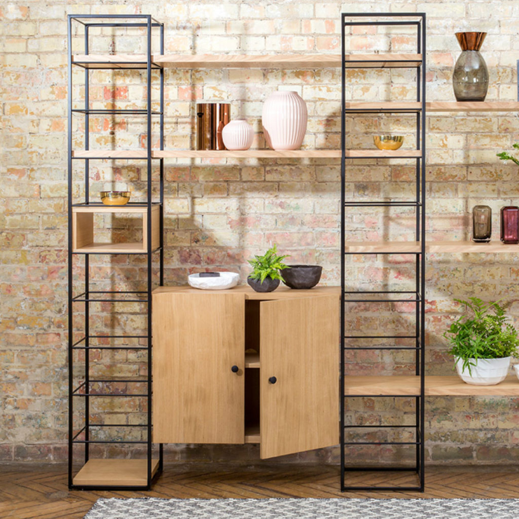 Tower Shelving Unit on a brick wall - ideal for storage in a small space