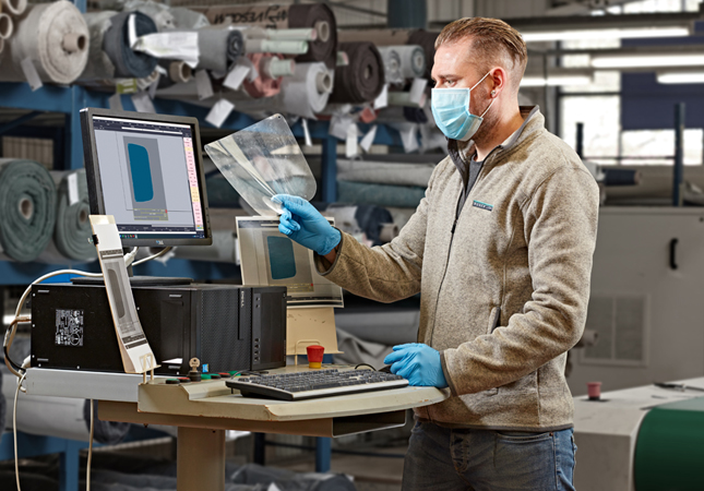 Face shields being manufactured at the Roger Lewis workshop