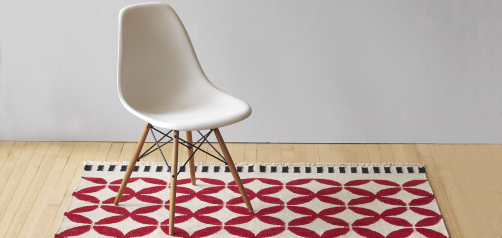 Kilim Rug with an Eames Eiffel Chair on top