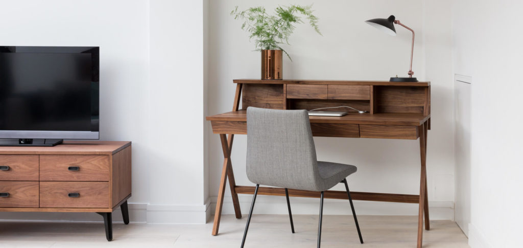 Copper plant pot in a home office