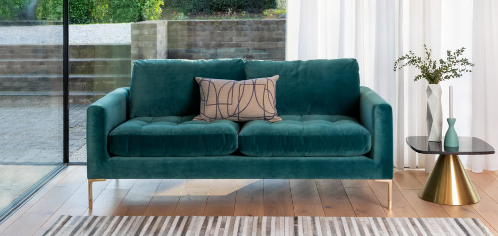 Eton teal sofa in a living room