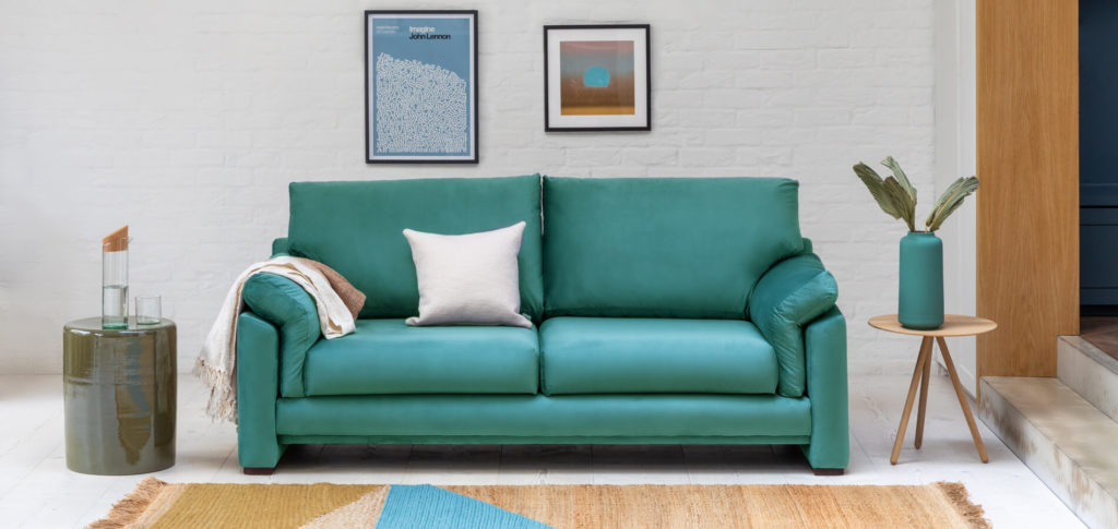 Paris teal sofa in a living room