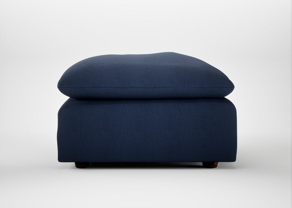 Astrid Ottoman Capelo Linen-Cotton Inkspot / Walnut Stained Beech
