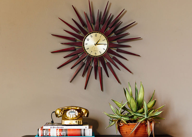 Pluto Starburst Gold Wall Clock