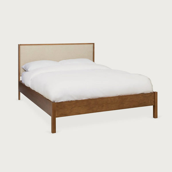 Walnut bed frame with upholstered headboard