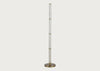 A modern floor lamp featuring a tall, slender alabaster column with gold-toned metal accents and a circular brushed brass base, shown against a solid light gray background.