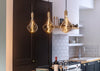 Linear Triple Pendant Canopy with Brass Fittings and 3 Sphere IV Bulbs