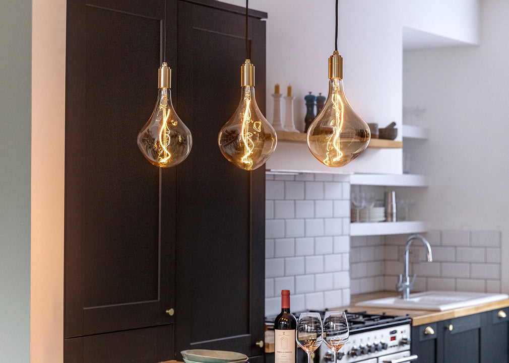 Linear Triple Pendant Canopy with Brass Fittings and 3 Sphere IV Bulbs