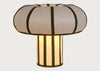 A mushroom-shaped table lamp with a white fabric cap and a striped white and gold paper shade, shown against a light gray background.