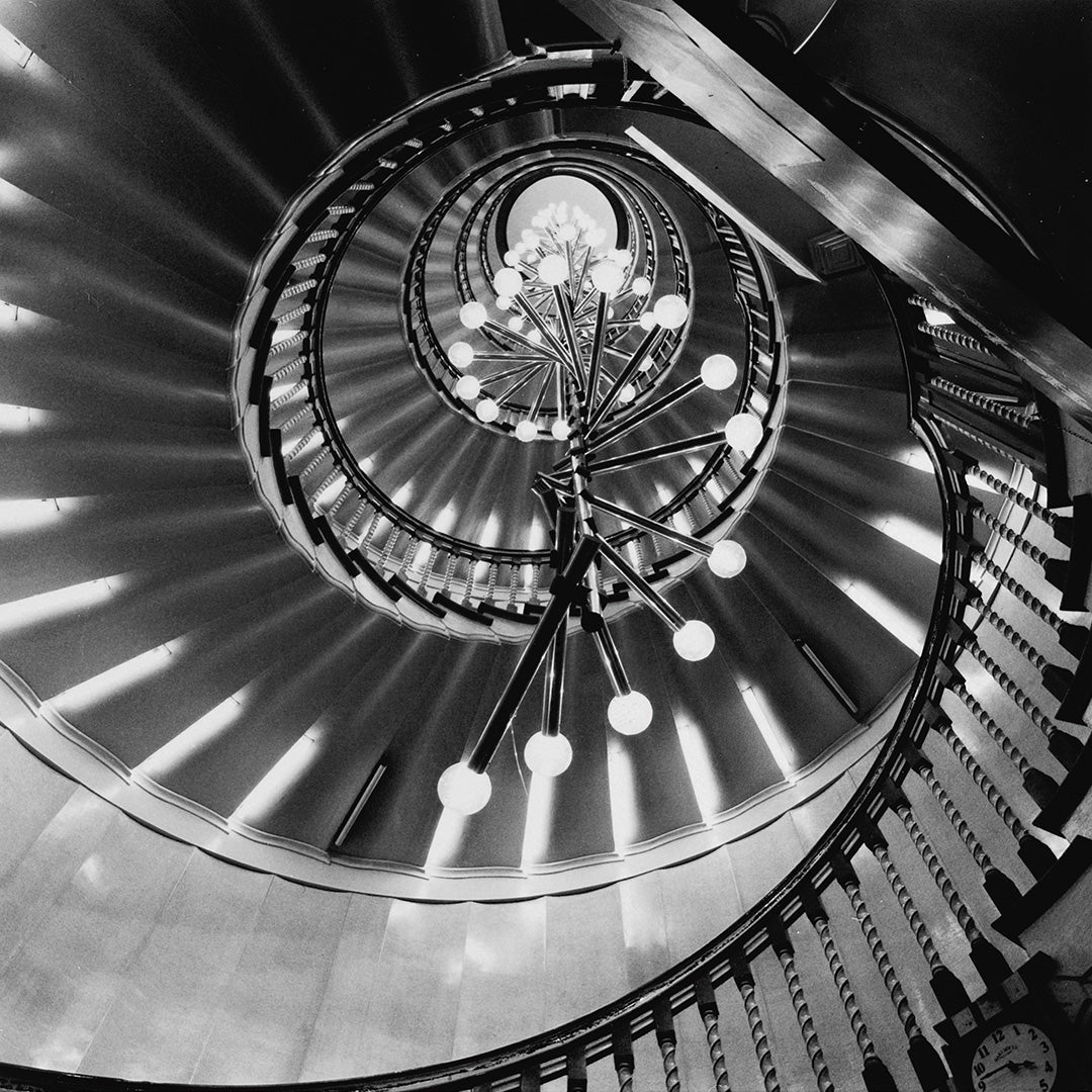 Cecil Brewer spiral staircase with Bocci chandelier at Heal's Tottenham Court Road