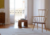 Tall Maia Side Table Walnut in a living room setting