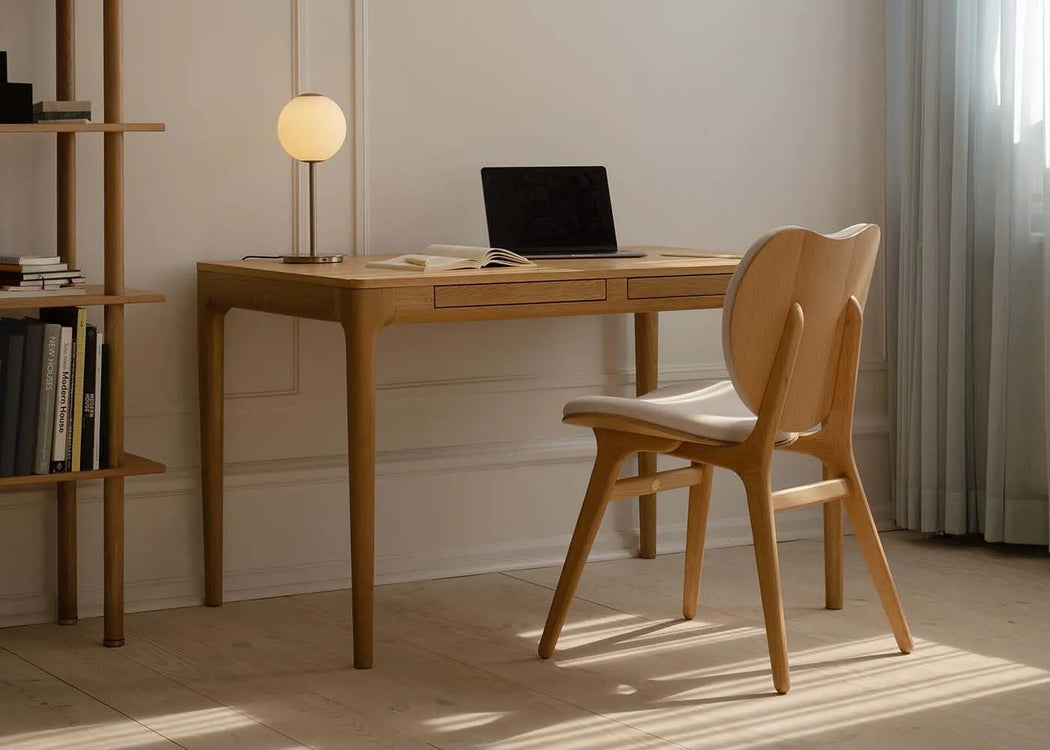 Audrey LED Table Lamp in Brass styled on an oak desk