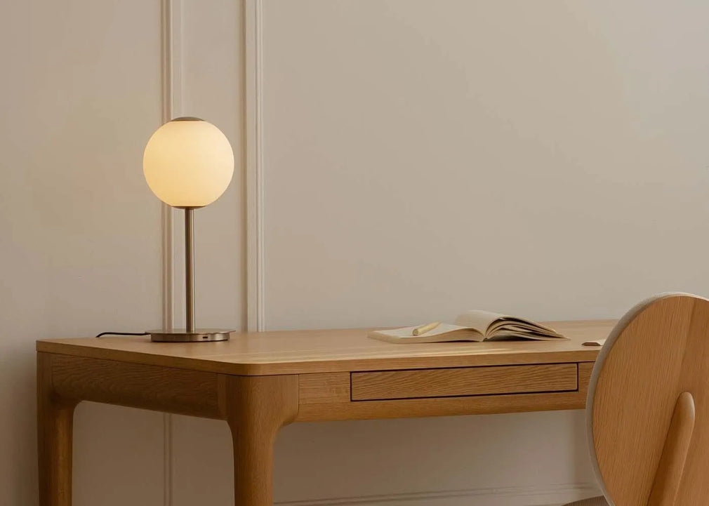 Umage Audrey LED Table Lamp Brass on Oak Desk