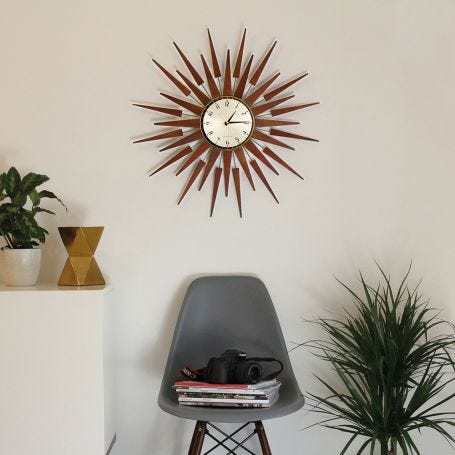 Pluto Starburst Gold Wall Clock