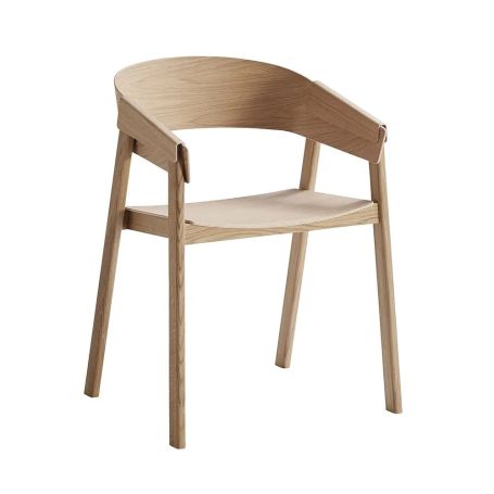 Back rest made of one piece of bent wood curves into comfortable armrests.