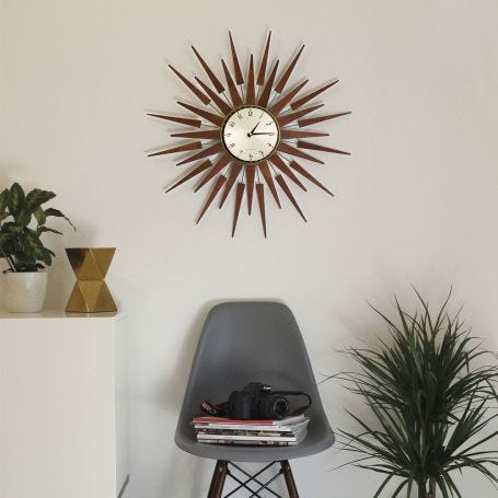 Pluto Starburst Gold Wall Clock